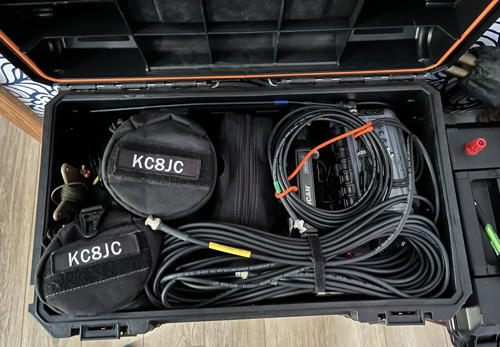 A pile of radio gear in a tool chest that mostly went unused.