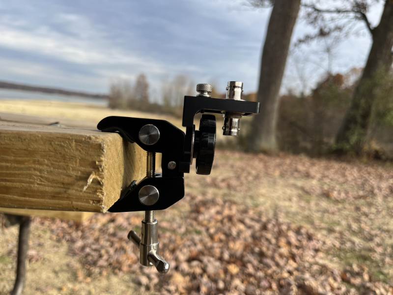 The AM1 clamped to a standard issue park picnic table.