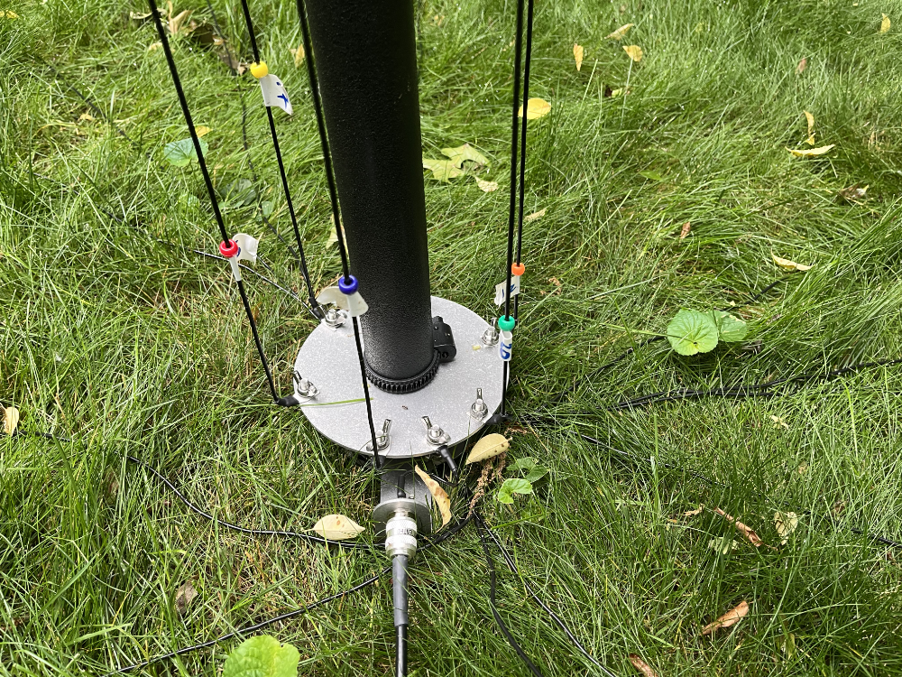 The installed baseplate with radials and element indentification beads in the colors of the rainbow.