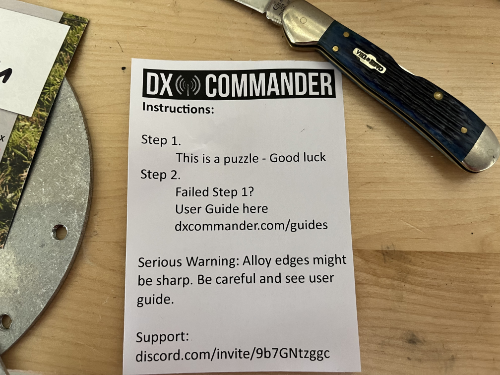 The DX Commander Instructions stating: Step 1. This is a puzzle - Good luck. Step 2. Failed Step 1? User guide here dxcommander.com/guides.