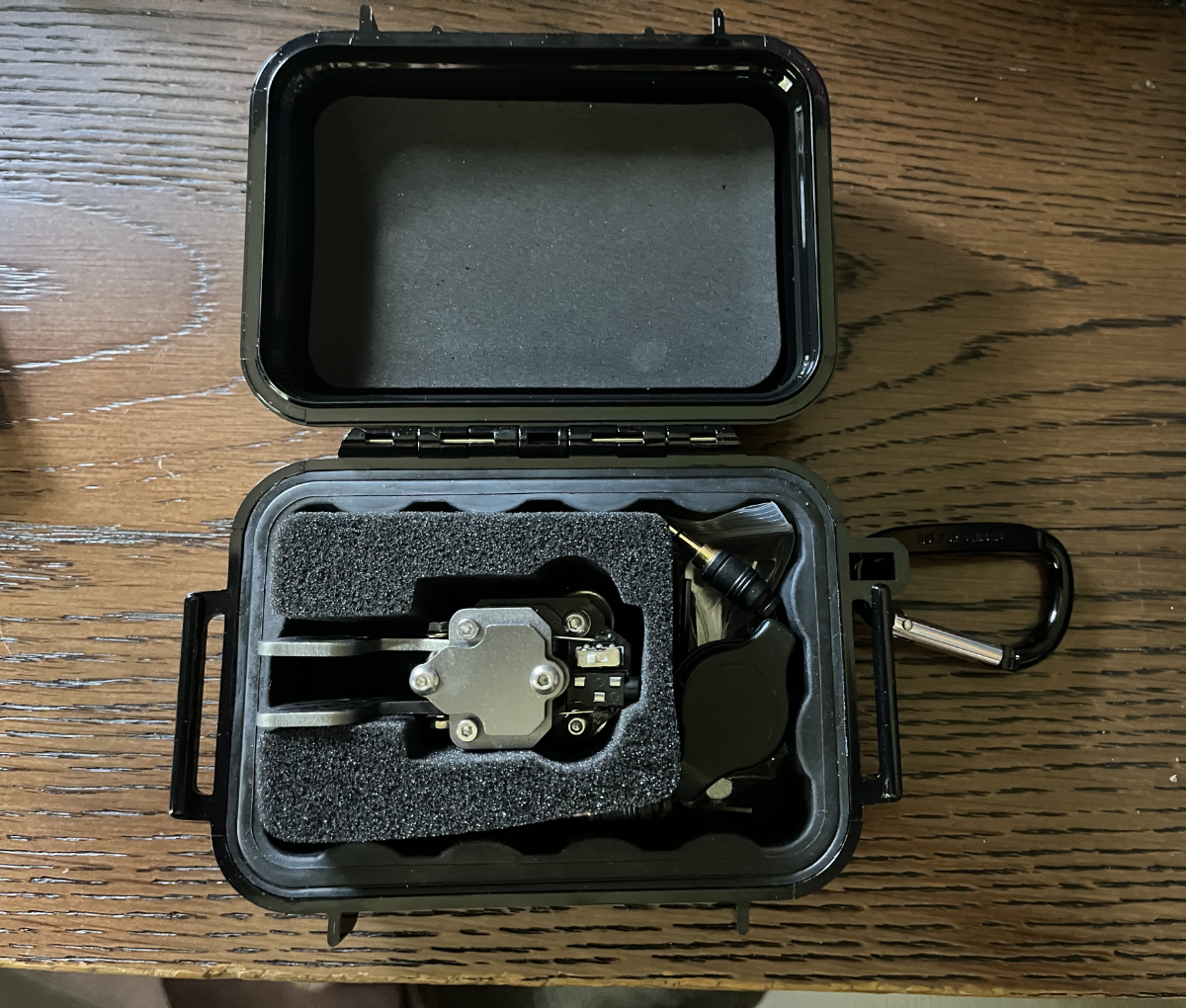 Putikeeg paddles in foam in a Pelican case.