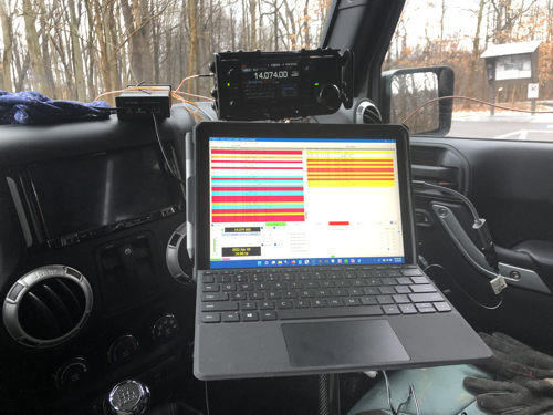 IC-705, Surface Go 2, and mAT-705 tuner set up in Jeep.