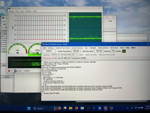 A screen showing Winlink Express and VARA HF sending and receiving email via HF.