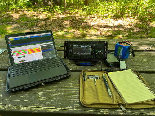 MS Surface Go 2, IC-705, and Log Book on a picnic table.