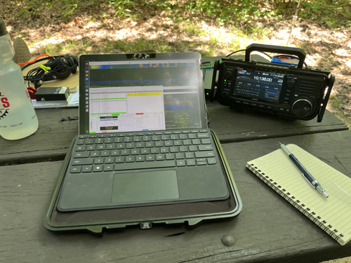Surface GO 2 next to IC-705 on a picnic table.