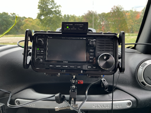 IC-705 with mAT-705 ATU on a lighting mount attached to the grab bar of the passenger side of the Jeep.