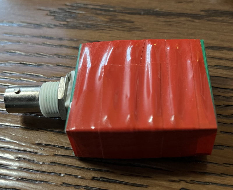 My original dummy load from a QRP Guys kit wrapped in red electrical tape to make it easier to see. Hmm.
