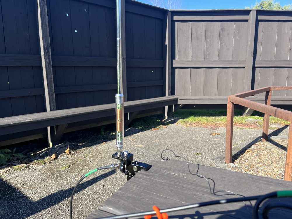 The Elecraft AX1 clamped to the picnic table.