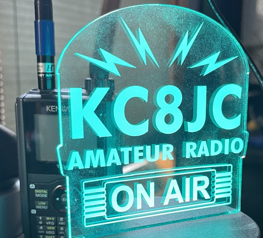KC8JC Amateur Radio ON AIR sign.